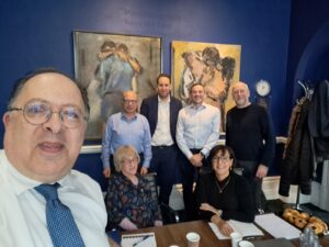 Selfie with David Mason, with synagogue members from Manchester in the background.