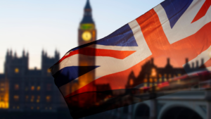 A view of Big Ben and the Houses of Parliament behind a transparent Union Jack