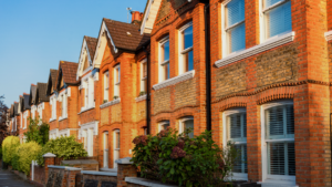 A row of terraced, red brick houses
